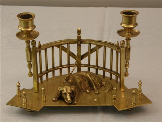 Appraisal: Late th early th century novelty brass desk stand modelled