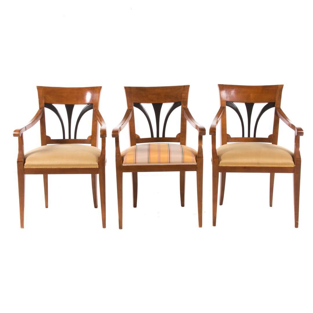 Appraisal: Three Italian Classical style cherrywood armchairs attributed to Zichele th