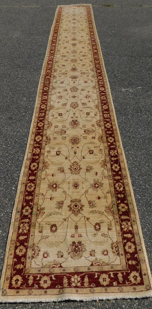 Appraisal: AGRA TURKISH RUNNER RUG Vintage ivory colored Agra Turkish runner