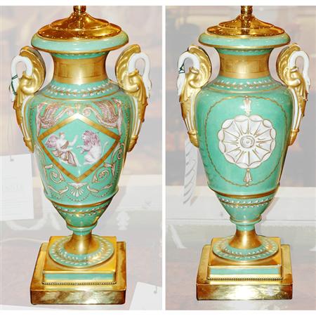 Appraisal: Pair of Paris Painted and Gilt Decorated Porcelain Lamps Estimate