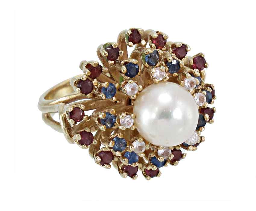 Appraisal: PEARL AND GEMSTONE GOLD RING K yellow gold ring centers