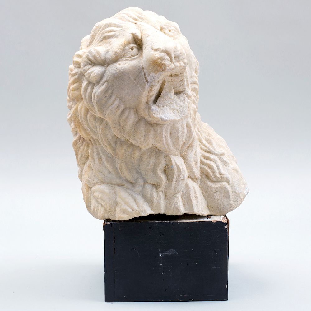 Appraisal: Medieval Carved Limestone Lion's Head Now raised on an ebonized