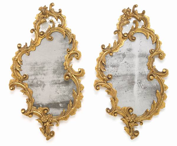 Appraisal: A pair of Italian Rococo style giltwood wall mirrors fourth