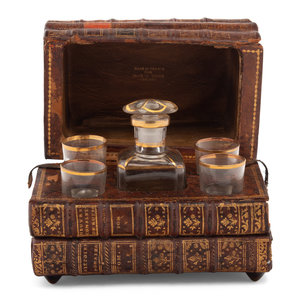 Appraisal: A French Musical Faux Book-Form Decanter Set Retailed by Blum's