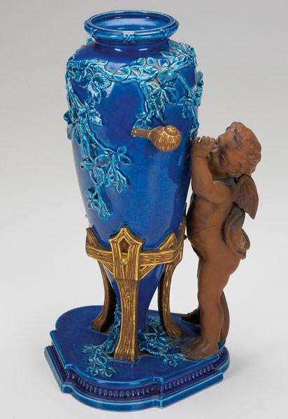 Appraisal: ROYAL WORCESTER Vine encrusted blue vase with figural snail handles