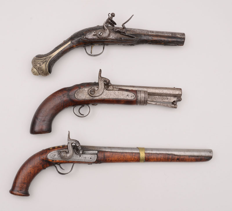 Appraisal: TWO PERCUSSION PISTOLS AND A FLINTLOCK PISTOL Two continental percussion