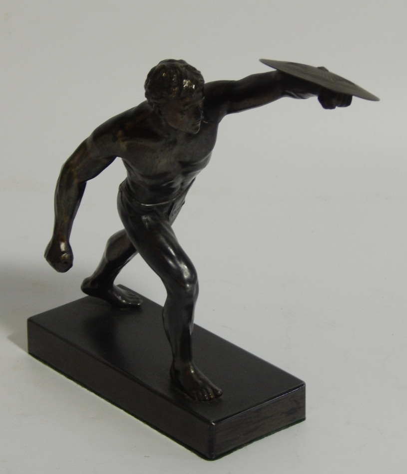 Appraisal: A thC patinated spelter figure of a Greek warrior in