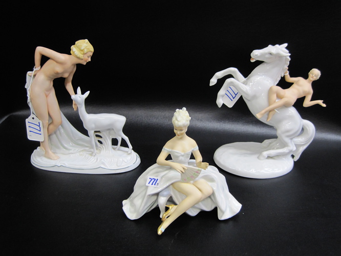 Appraisal: THREE GERMAN SCHAUBACH KUNST PORCELAIN FIGURINES painted bisque and glazed