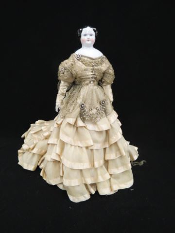 Appraisal: Large China Head Doll in Silk dress with pearl trim