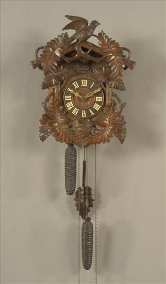 Appraisal: A Black Forest weight-driven cuckoo clock Unsigned circa The weight-driven