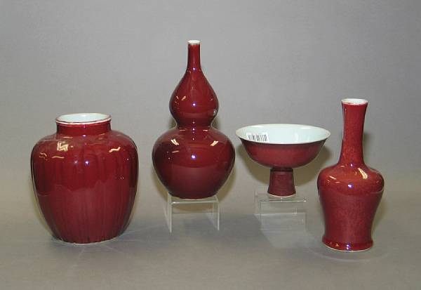 Appraisal: Four flamb glazed porcelain vases th Century Including one stick