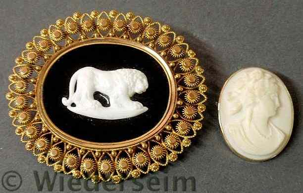 Appraisal: Two k yg cameo brooches- one with an elaborately framed