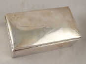 Appraisal: A sterling silver cigarette box x x cm high Birmingham