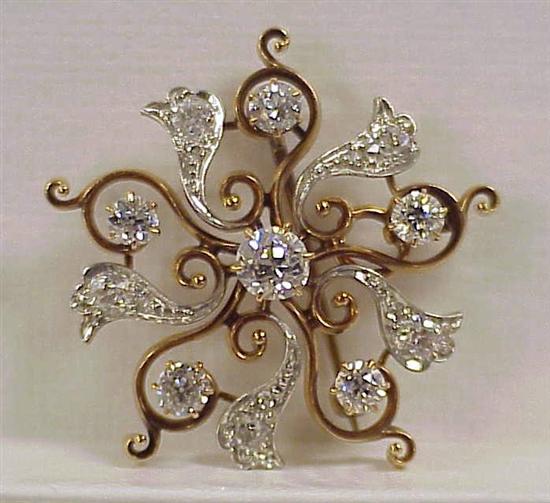 Appraisal: JEWELRY K yellow gold tested starburst pin with platinum top