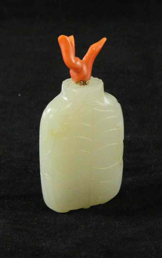 Appraisal: A Chinese white jade zoomorphic snuff bottle th century carved