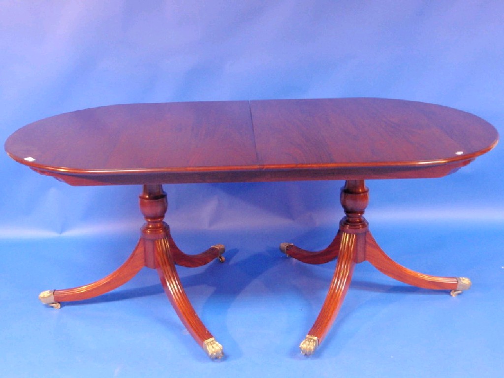 Appraisal: A good quality mahogany reproduction Regency extending dining table