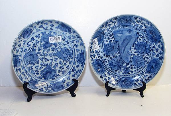 Appraisal: Two blue and white porcelain deep dishes with flower head