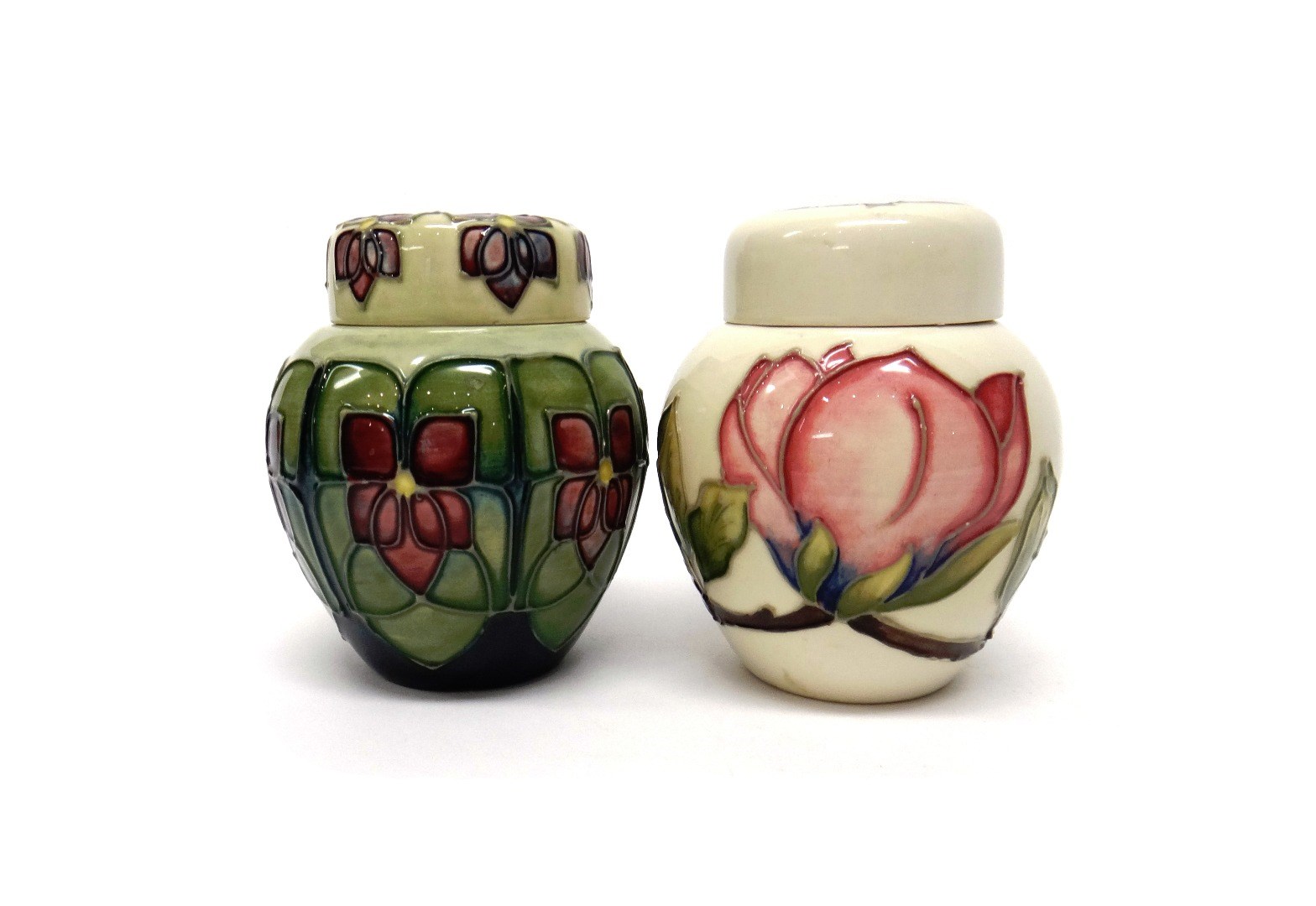 Appraisal: Two Moorcroft ginger jars and covers circa one with a