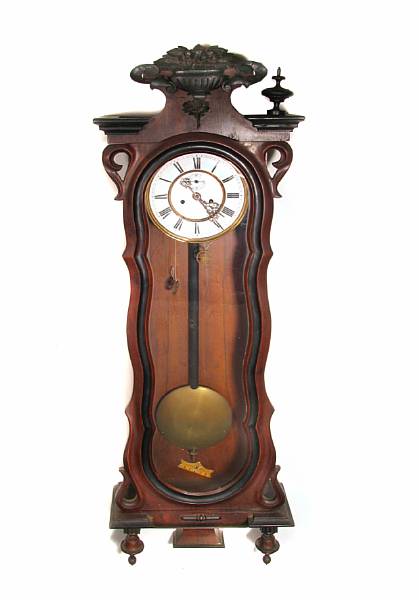 Appraisal: A Renaissance Revival partial ebonized wall clock losses height in