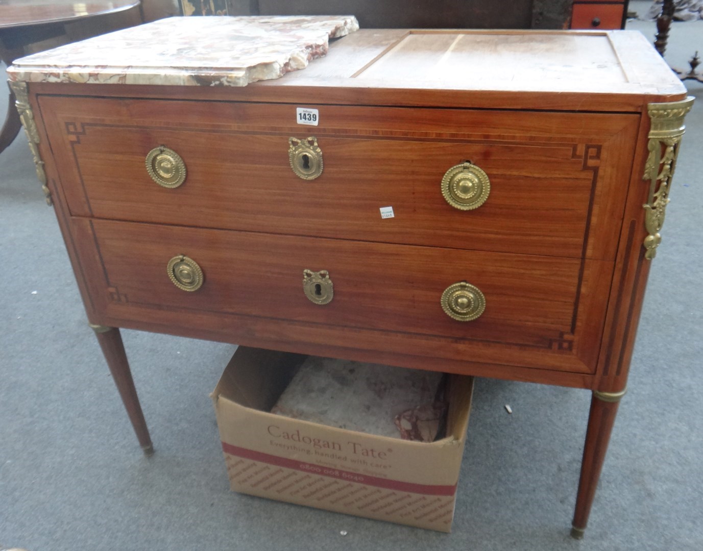 Appraisal: A Louis XVI ormolu mounted tulipwood banded kingwood two drawer