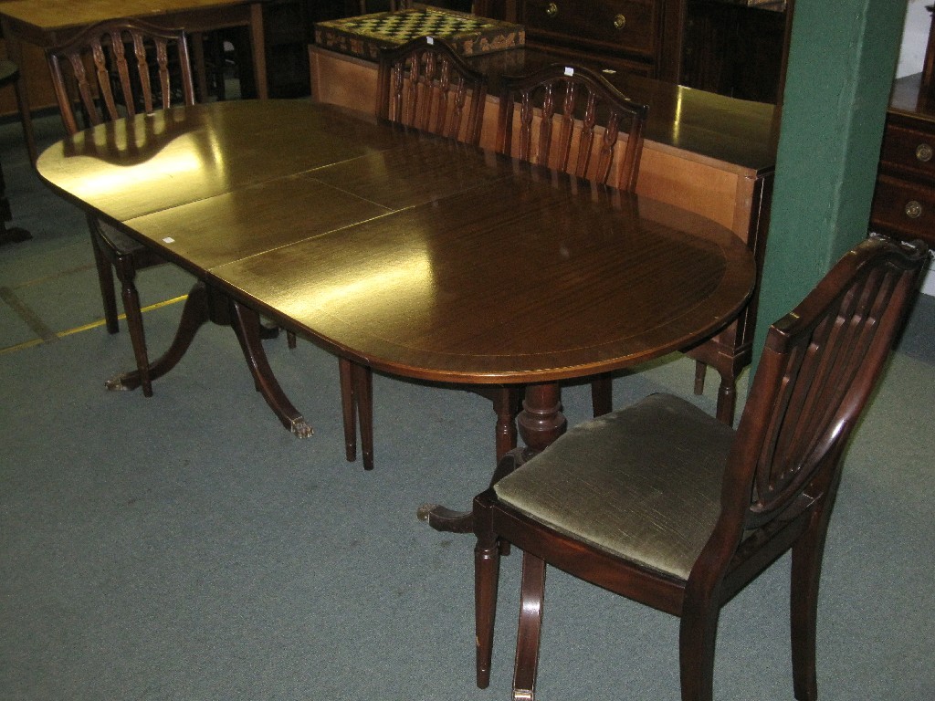 Appraisal: Regency style dining suite comprising sideboard twin pedestal table and