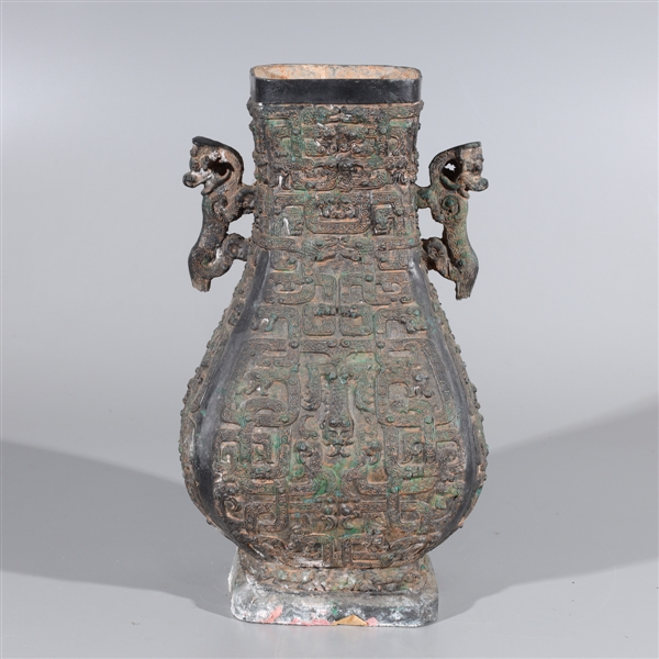 Appraisal: Chinese bronze archaistic vase with allover molded designs and dragon