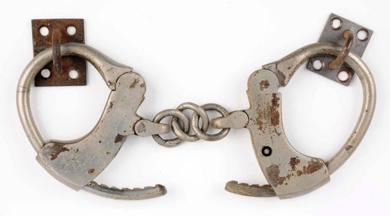 Appraisal: Judd Handcuff Patent Does not have a key Has some