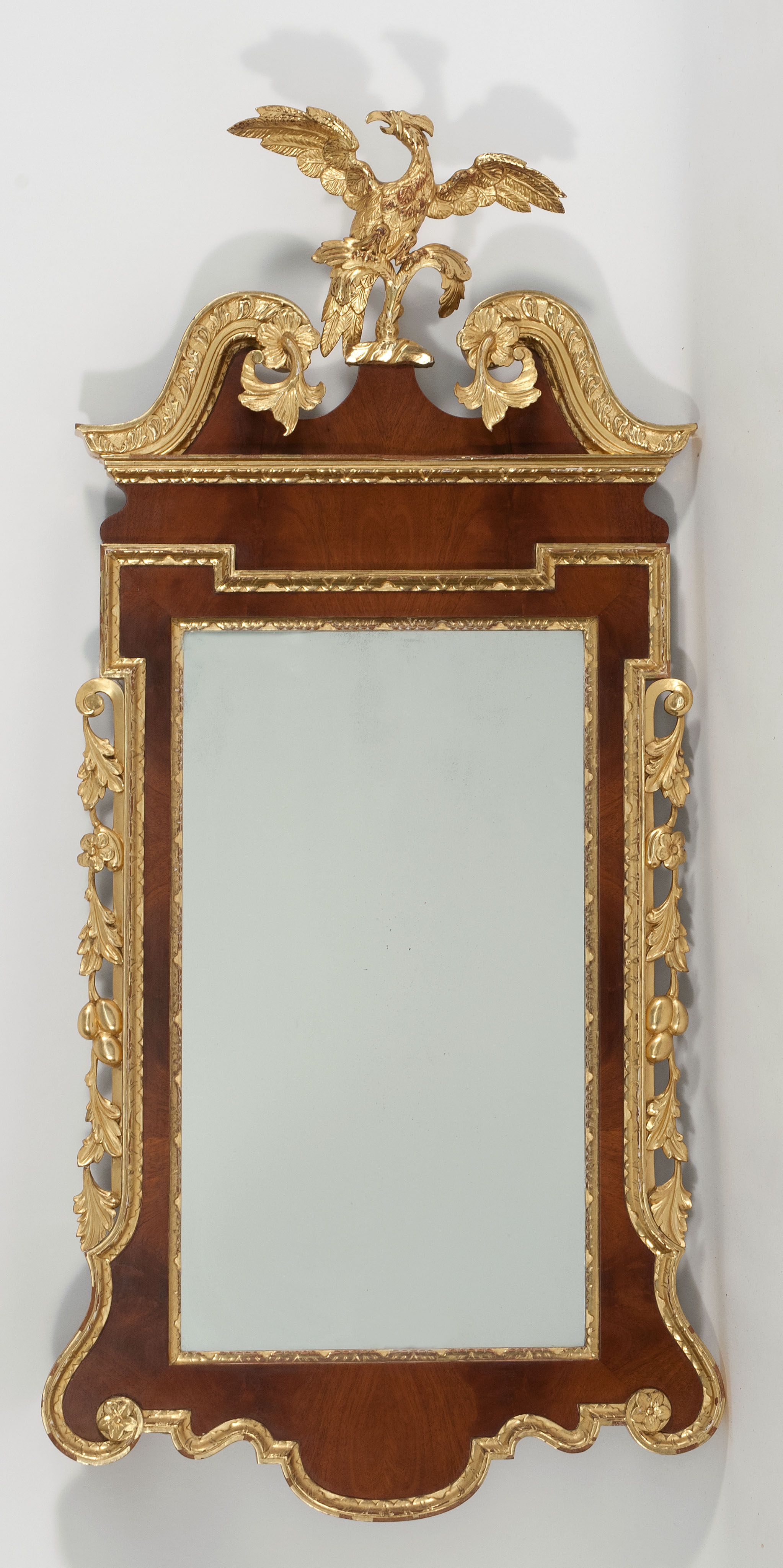 Appraisal: CUSTOM-MADE CHIPPENDALE-STYLE MIRROR Gilt and mahogany veneer frame with a