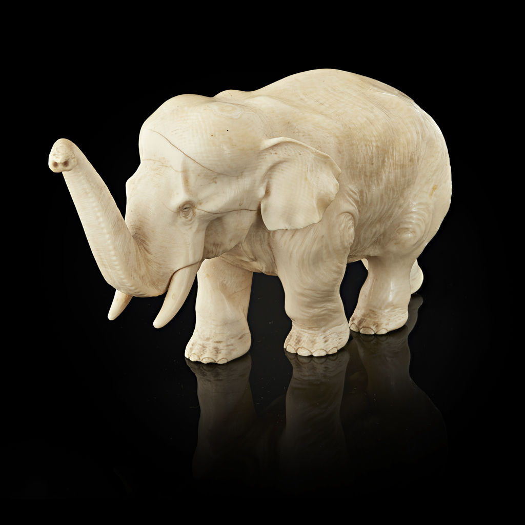 Appraisal: YCARVED IVORY OKIMONO OF AN ELEPHANT SIGNED GYOKUMIN MEIJI PERIOD