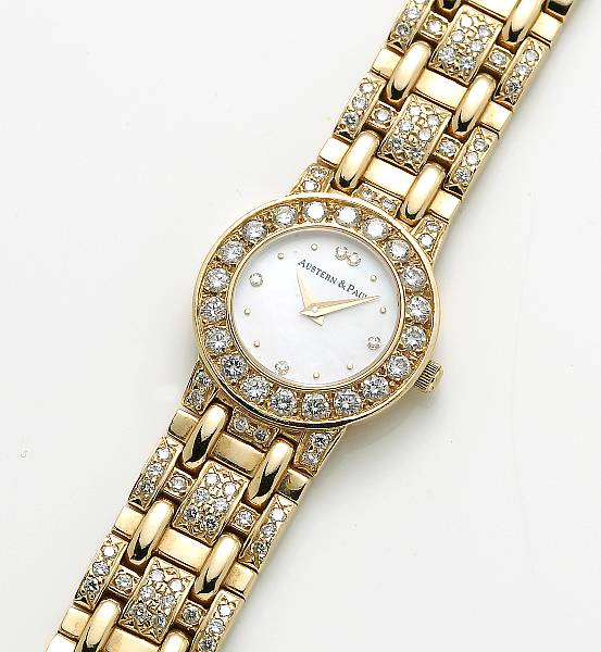 Appraisal: A diamond mother of pearl and k gold wristwatch Austern