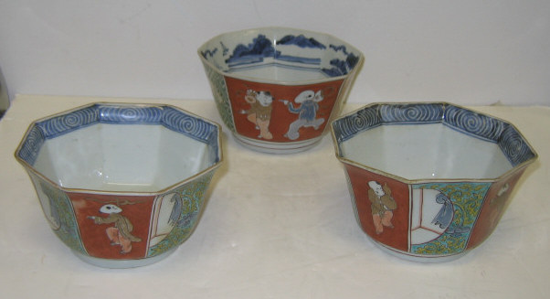 Appraisal: THREE JAPANESE PORCELAIN BOWLS Each flared octagonal painted rim and