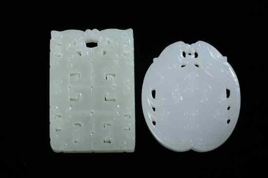 Appraisal: TWO CHINESE WHITE AND CELADON JADE PENDANTS One carved with