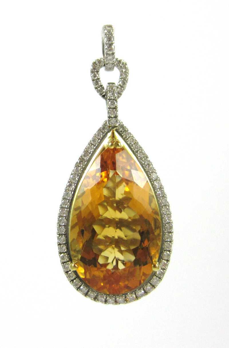 Appraisal: CITRINE AND FOURTEEN KARAT GOLD PENDANT The white and yellow