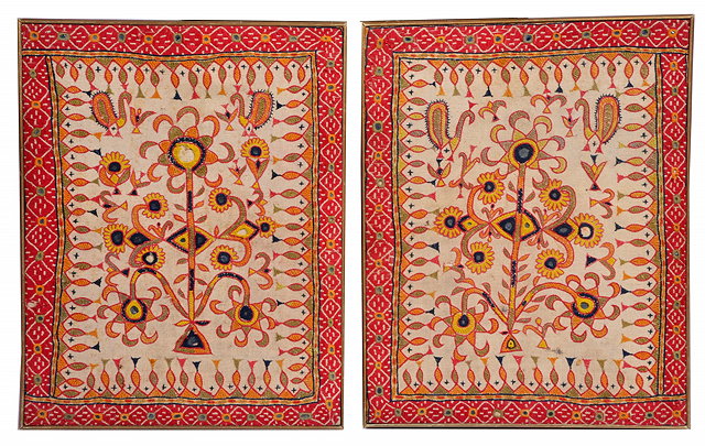 Appraisal: A PAIR OF INDIAN NEEDLEWORK RECTANGULAR PANELS with mirrored peacock