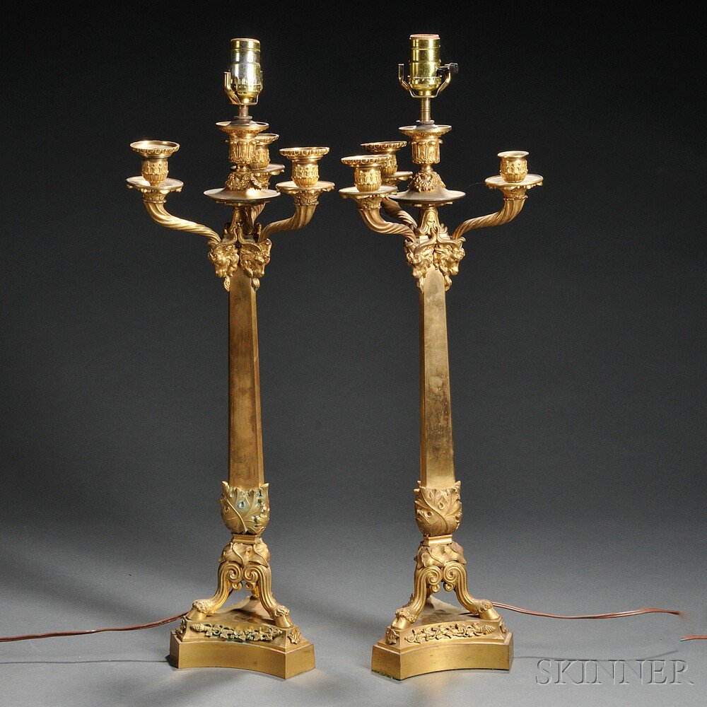 Appraisal: Pair of Empire-style Gilt-metal Four-light Candelabra France early th century