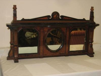 Appraisal: AN AESTHETIC OVERMANTEL in ebony and coromandel with stringing and