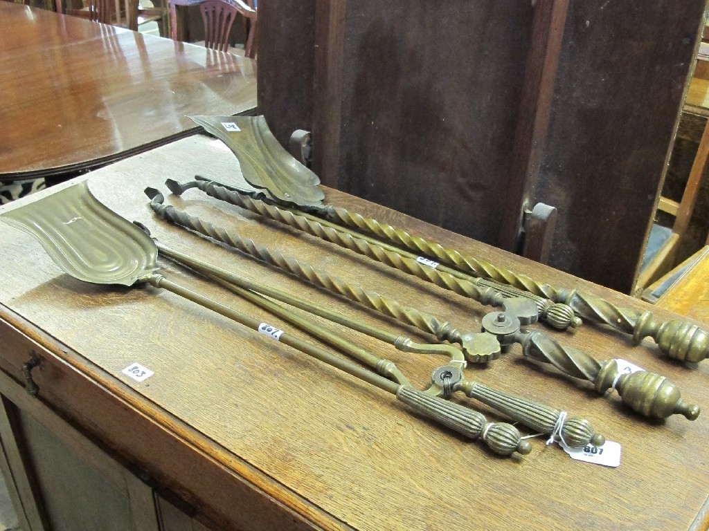 Appraisal: Five assorted brass fire irons