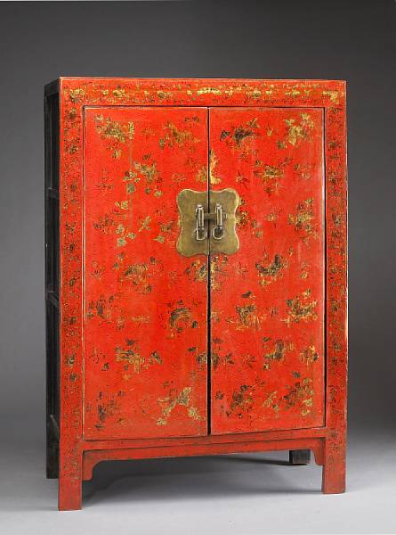 Appraisal: A Chinese red lacquer and parcel-gilt decorated cabinet th century