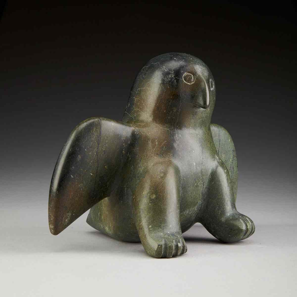 Appraisal: UNIDENTIFIED OWL WITH WINGS SPREAD Medium stone height cm height