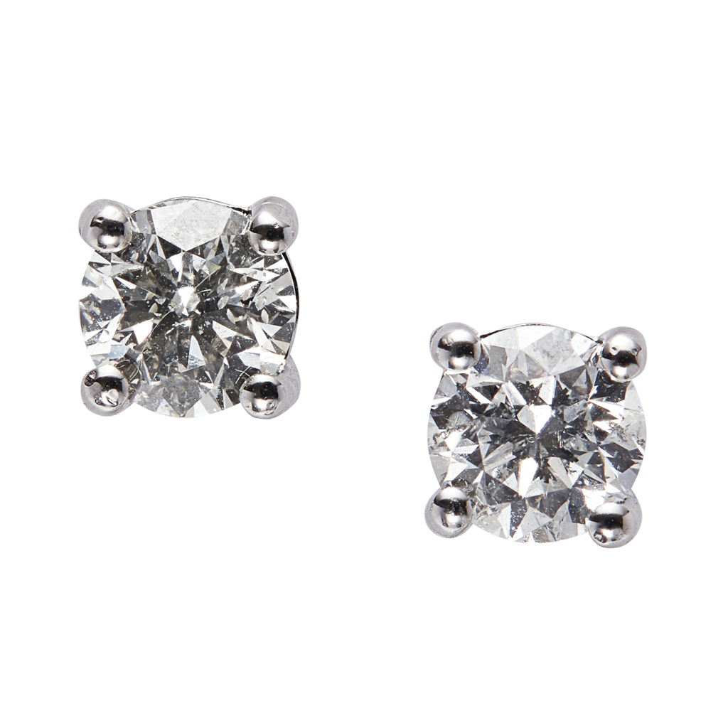 Appraisal: A pair of diamond stud earrings each claw set with