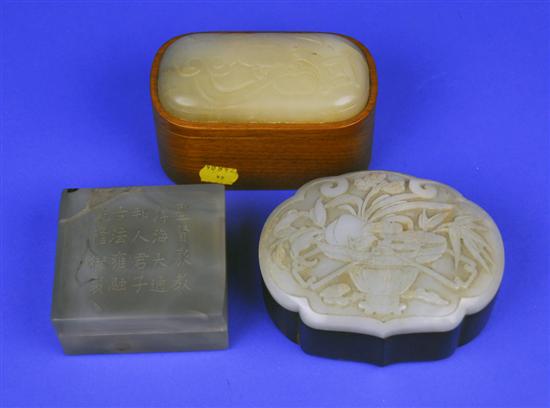 Appraisal: TWO CHINESE WOOD BOXES WITH CARVED HARDSTONE LIDS and a