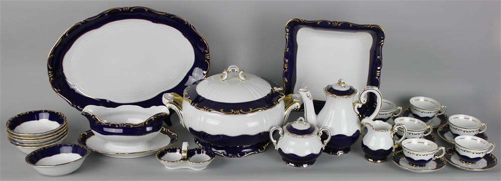 Appraisal: ZSOLNAY PORCELAIN DINNER SERVICE having a gilt decorated cobalt blue