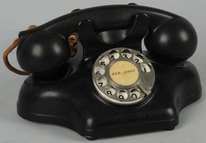 Appraisal: Kellogg Cradle Telephone Circa black plastic minor chip in housing