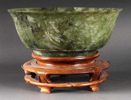 Appraisal: Chinese seafoam green stone bowl exterior with carved dragon relief