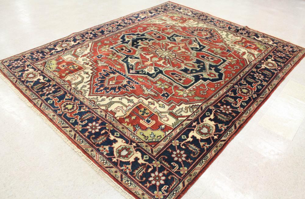 Appraisal: HAND KNOTTED ORIENTAL CARPET Indo-Persian Serapi or Heriz design on