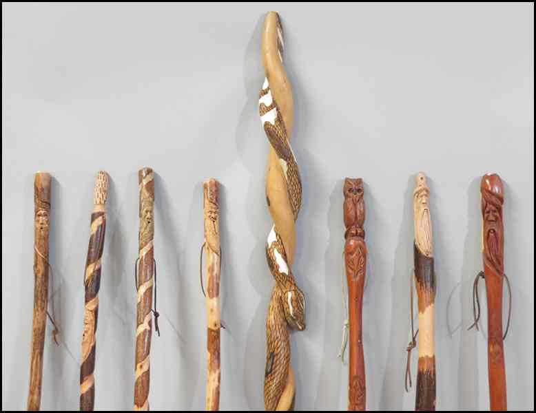 Appraisal: GROUP OF CARVED WOOD WALKING STICKS STAFFS Tallest '' Condition