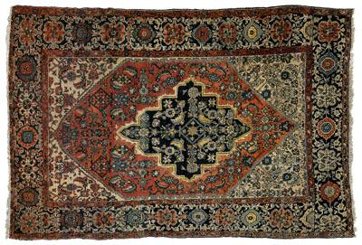 Appraisal: Ferahan rug dark blue central medallion with ivory border on