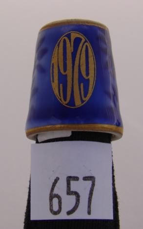 Appraisal: B G Denmark thimble marked in gilt on blue floral