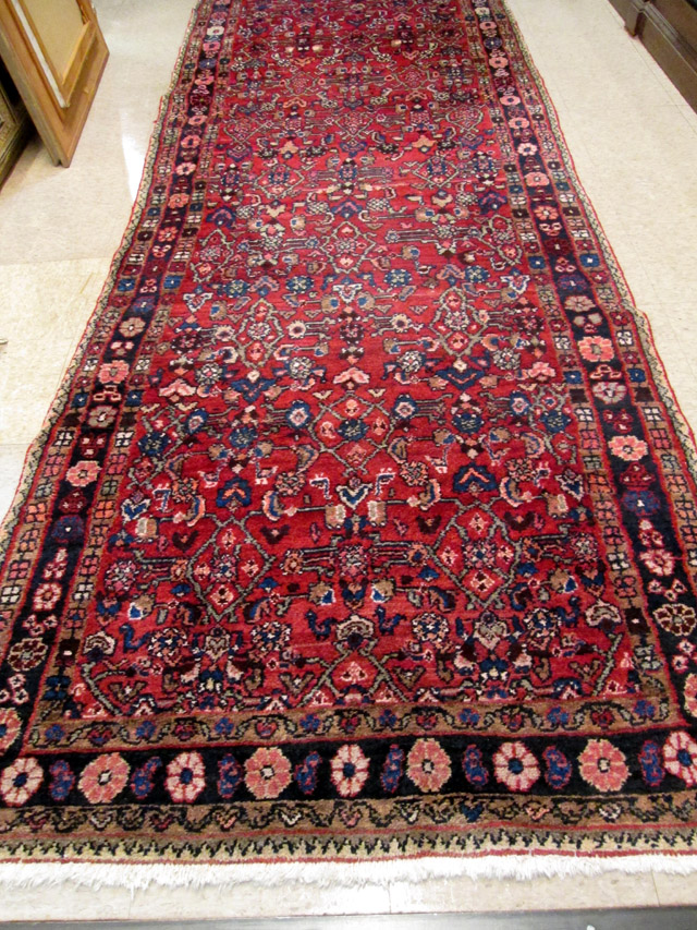 Appraisal: SEMI-ANTIQUE PERSIAN TRIBAL CARPET hand knotted in an overall Herati