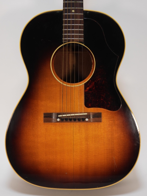 Appraisal: GIBSON LG- ACOUSTIC SUNBURST GUITAR United States Gibson LG- acoustic